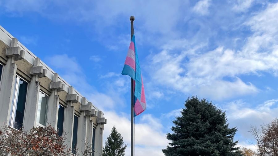 The transgender pride flag flying at the Castlegar Campus